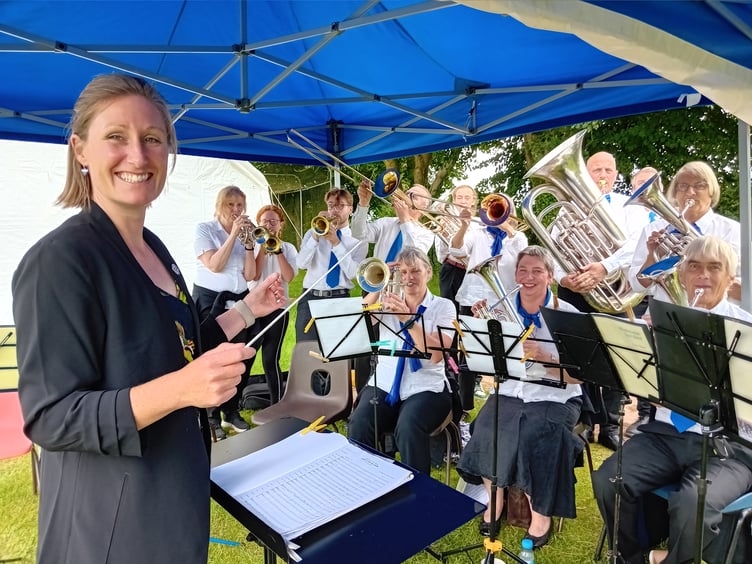 Wiveliscombe Town Band conducted by Charlotte Stus delighted Fitzhead fete goers with their music. PHOTO: Sue Mitchison.
