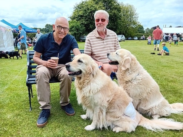 Fitzhead fete welcomed canine and other visitors, left to right, Jonathan Wills, Barry Land, and his dogs Darcey and Fleur. PHOTO: Sue Mitchison
