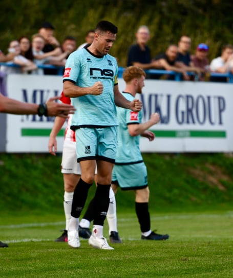 Ryan Kinnane celebrates after scoring Farnham's equaliser against Bracknell Town