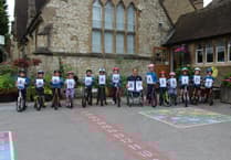 Farnham school gears up for Olympics as Paralympic cyclist pays a visit