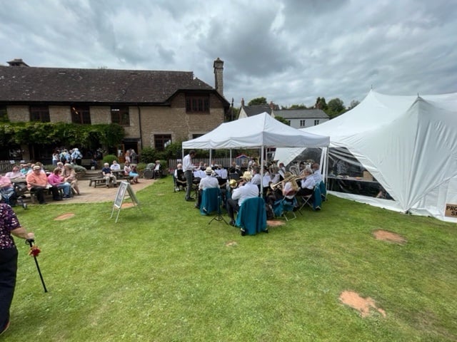 Watchet Brass Band perform for Roadwater Fete visitors.