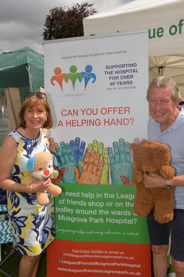 Wellington's very own Clinton Rogers, a Somerset Deputy Lord Lieutenant, and president of the League of Friends of Musgrove Park Hospital, with league fund-raising chairman Liz Kingston at Taunton Flower Show. PHOTO: Alain Lockyer.