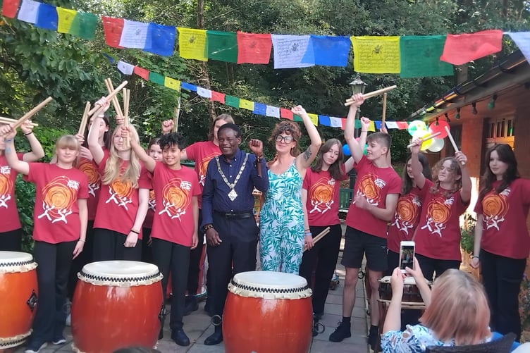Brodie Mauluka with the Taiko drummers