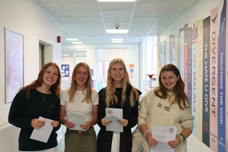 Eloise, Jasmine, Skye and Lily with their results at Poltair School.