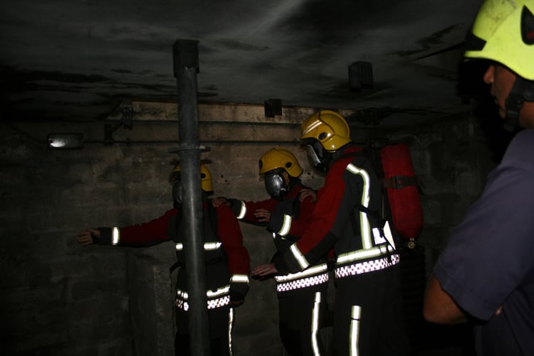 Exploring a "burning building" while wearing breathing apparatus