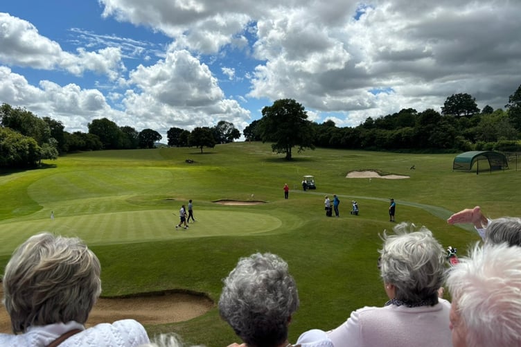 The final players come in on the 18th