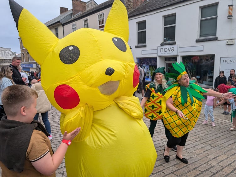 Pikachu joined the Equally Abled parade and brought joy to children watching