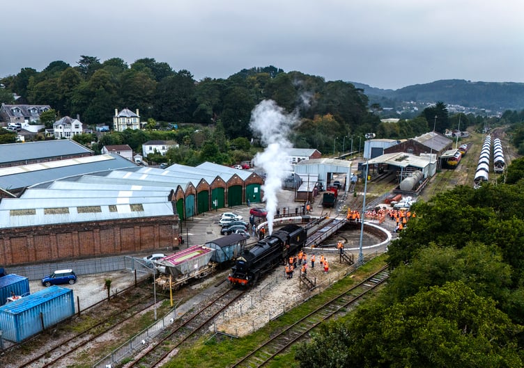 Steam rises as the locomotive leaves the turntable. Picture: Paul Williams