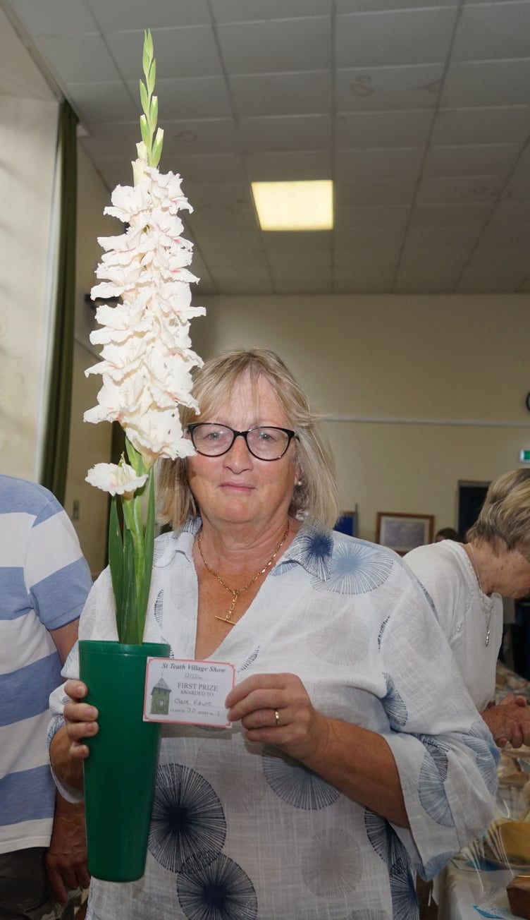 Clare Rowe with her prize winning Gladioli (Picture: Adrian Jasper)
