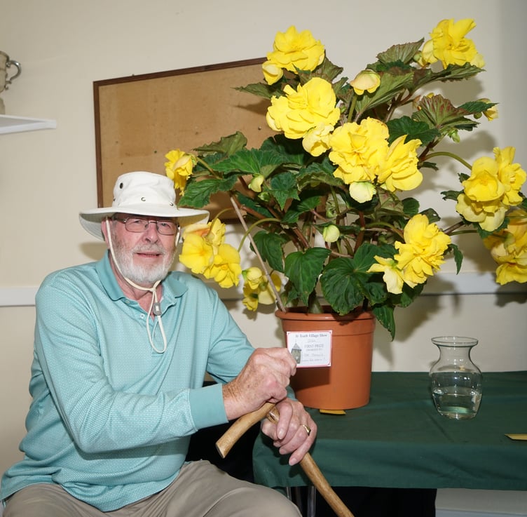 Taking first prize with his Begonia In Flower is Joe Beavis (Picture: Adrian Jasper)
