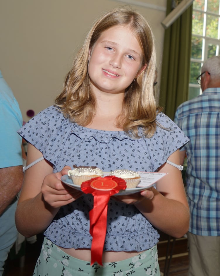 Brooke Sleeman with a first prize and a trophy winner with her two Decorated Buns (Picture: Adrian Jasper)