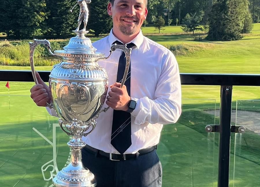 <p>Dave Barrett with the Dupree Challenge trophy</p>