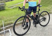 Freewheeling boss completes Alpine cycle for African charity