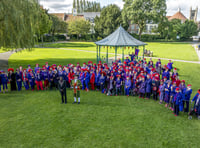 Shoppers see red as mad hatters make a beeline to Farnham
