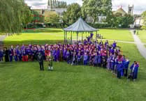 Shoppers see red as mad hatters make a beeline to Farnham