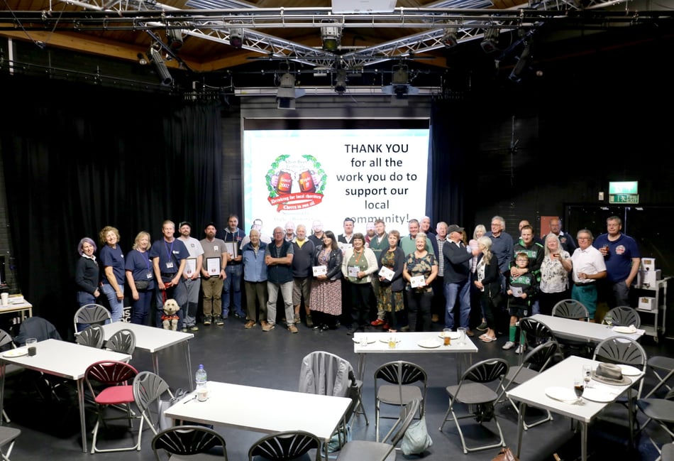<p>Charities receive their shares of the proceeds from the spring 2024 Alton Beer Festival (Photo: Alton Beer Festival).</p>