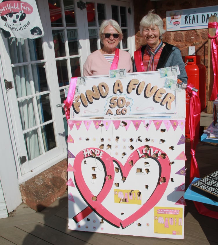 Wendy Vaughn and Lorna Robbins ran a 'find a fiver' stall to support a cancer charity fund-raising weekend at Minehead's Jubilee Cafe. PHOTO: George Ody.