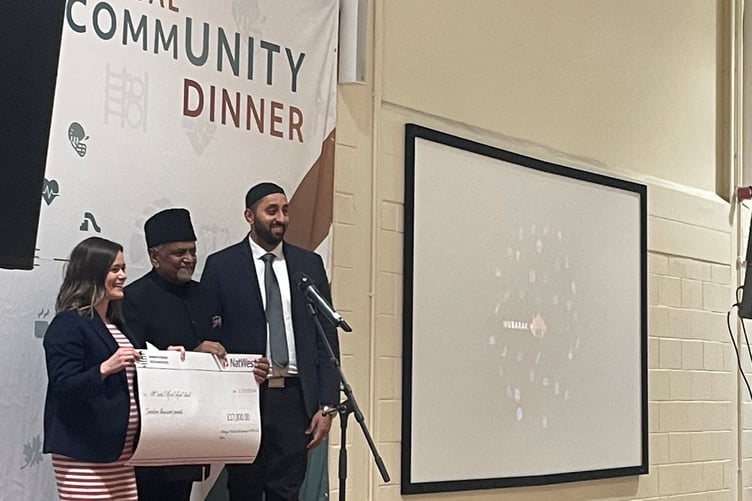 Cheque presented at Annual community dinner