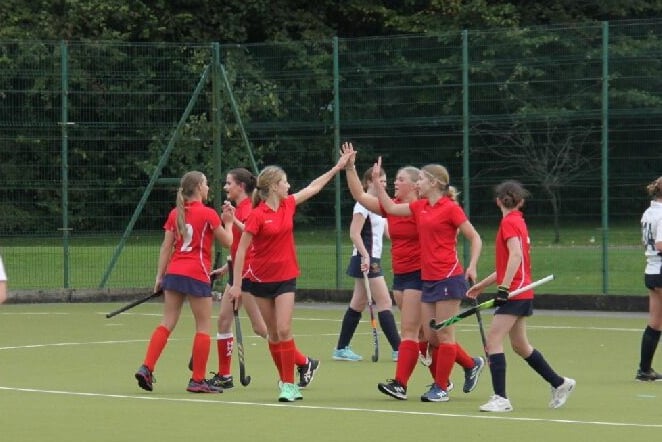 Petersfield Hockey Club's under-16 girls celebrate their goal