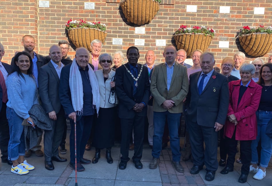 <p>Friends, relatives and dignitaries beside Pauline Baynes's plaque, added last week to the Notable Names of Farnham wall.</p>