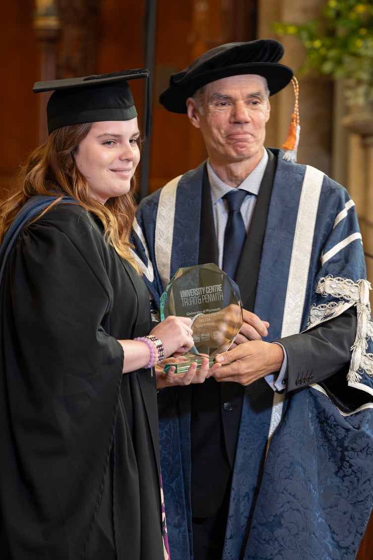 Caley Witchell receives her award from Professor John Curnow