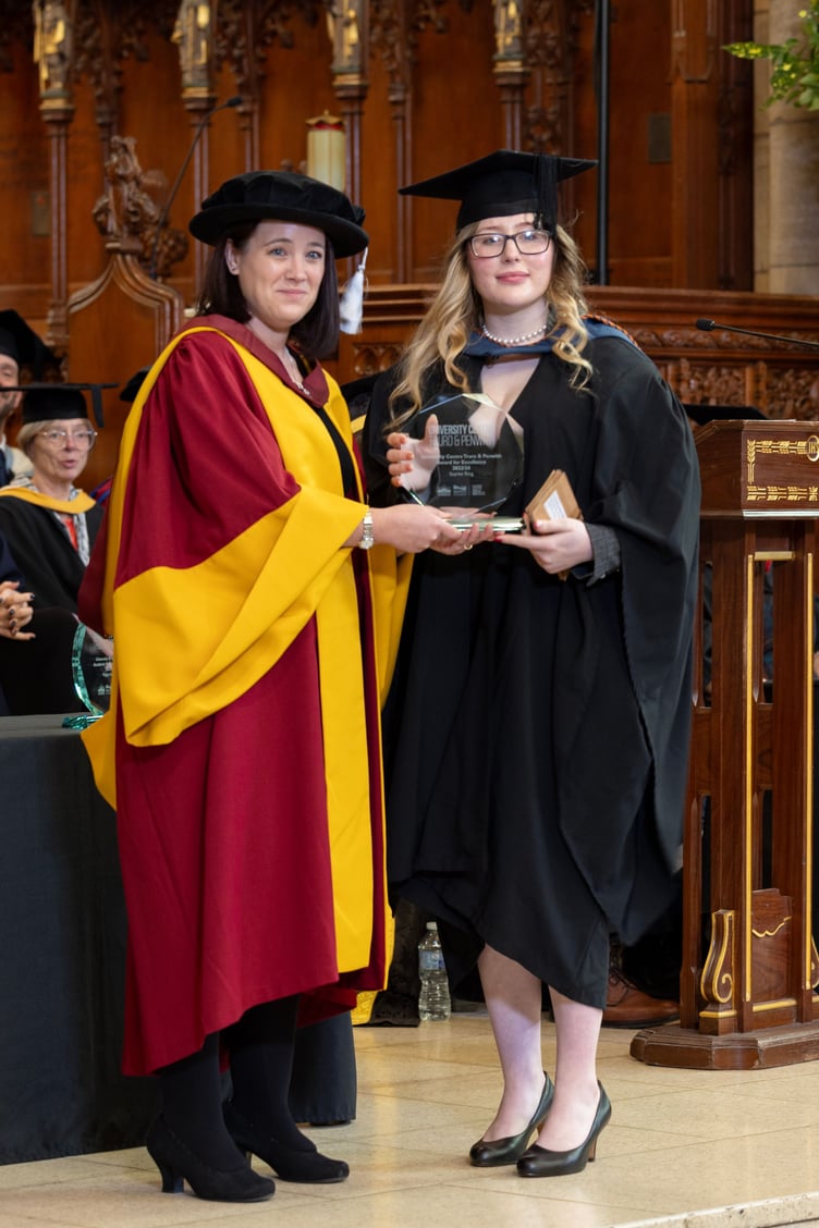 Scarlet Ring receives her award from Dr Emily Myatt
