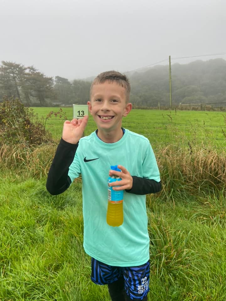 Edward from Carbeile Junior School, Torpoint. It was his first time doing two laps, and his family added: "So proud"