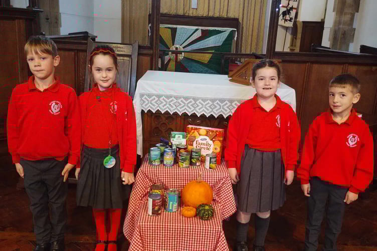 Year two pupils with a small selection of the food collection.