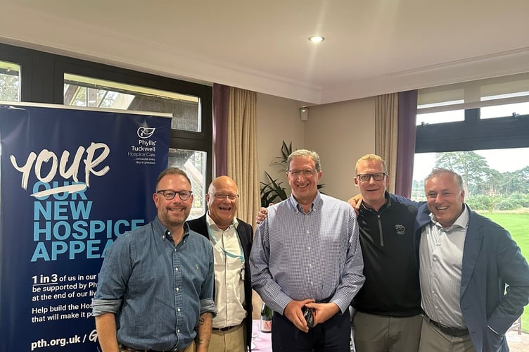 Tony Carpenter, director of marketing and communications at Phyllis Tuckwell, with the winning team at this year’s Hankley Common Golf Day. Source PTH