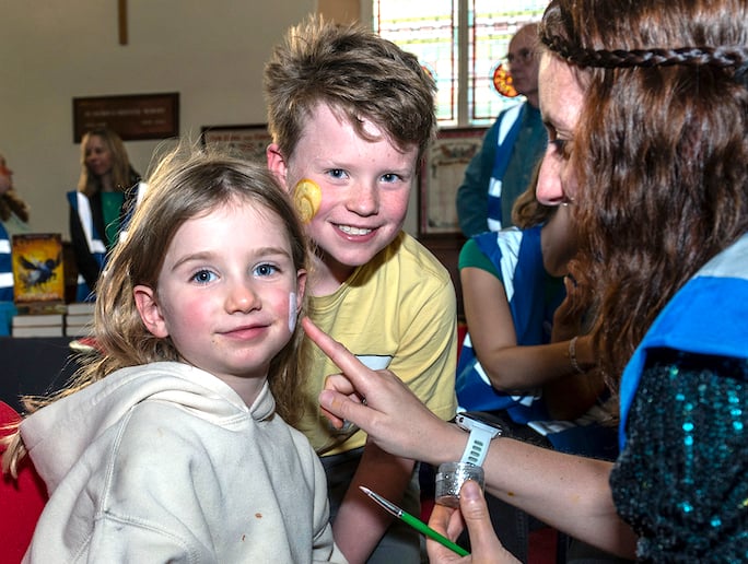 Fans being face-painted at the event. Picture: Paul Williams