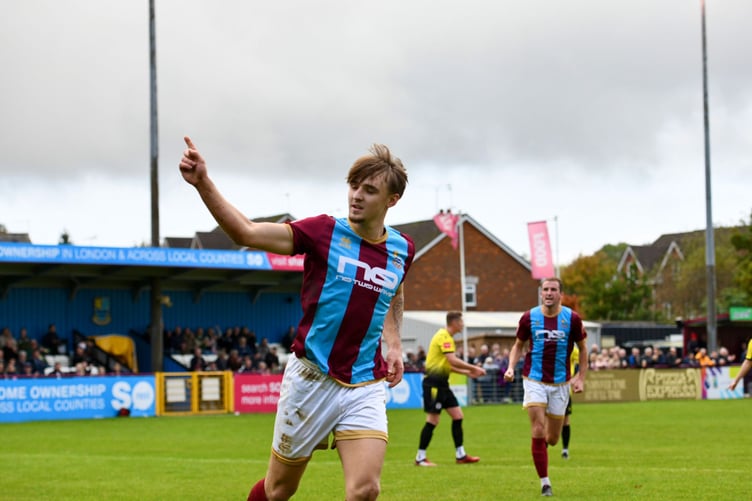 Owen Dean celebrates after scoring Farnham Town's second goal against Horndean