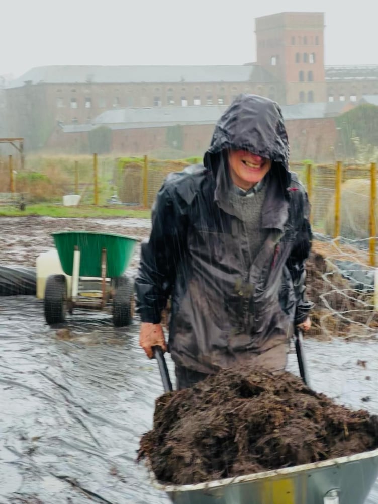 Battling the weather to keep on top of the Forest Garden in Fox's Field, Wellington.