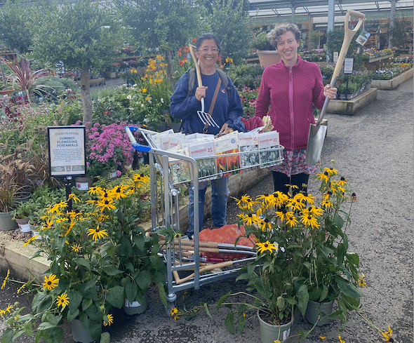 Transition Town Wellington's Anita Roy (left) and Helen Gillingham spending some of a £2,000 award in Blackdown Garden Centre.