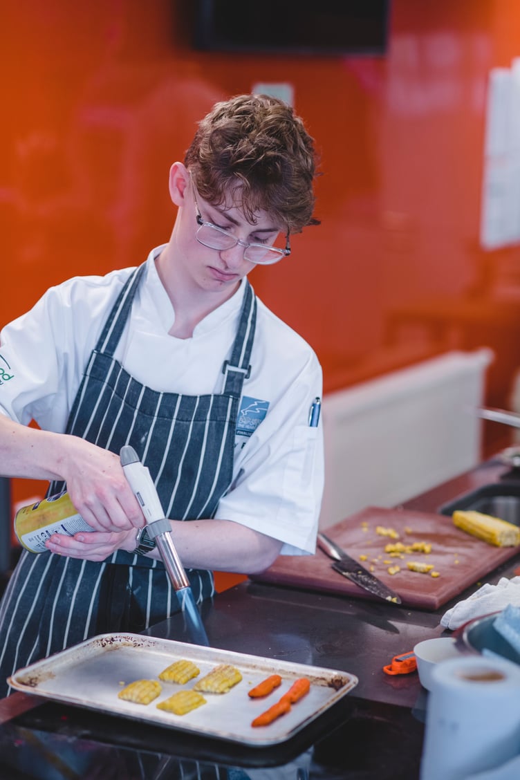 Toby Pyne preparing his dish