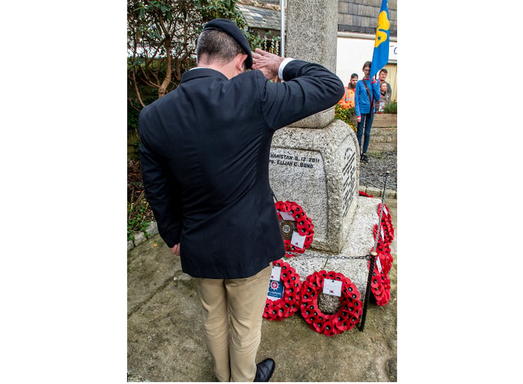 Paying respects at the Mevagissey Remembrance Sunday ceremony. Picture: Paul Williams