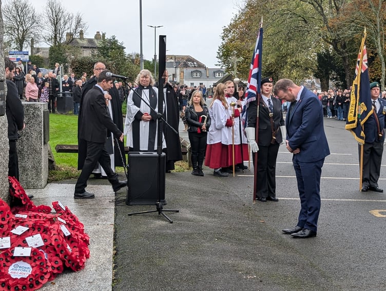 Ben Maguire, the MP for North Cornwall bows in tribute after laying a wreath. (Picture: Aaron Greenaway/Tindle)