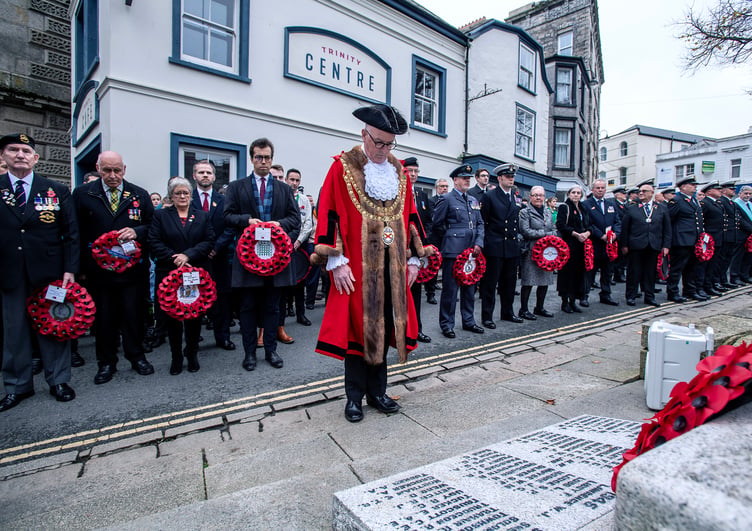 St Austell Mayor Cllr Julian Young pays his respects. Picture: St Austell Town Council/Paul Williams
