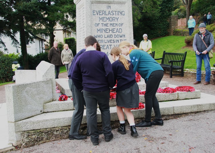 Wreath laying by Minehead Middle School pupils at the war memorial on North Hill. PHOTO: George Ody.