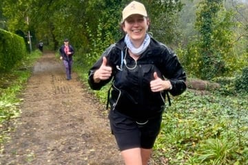 Sarah Kingsbury battles through the wet conditions along the Downs Link