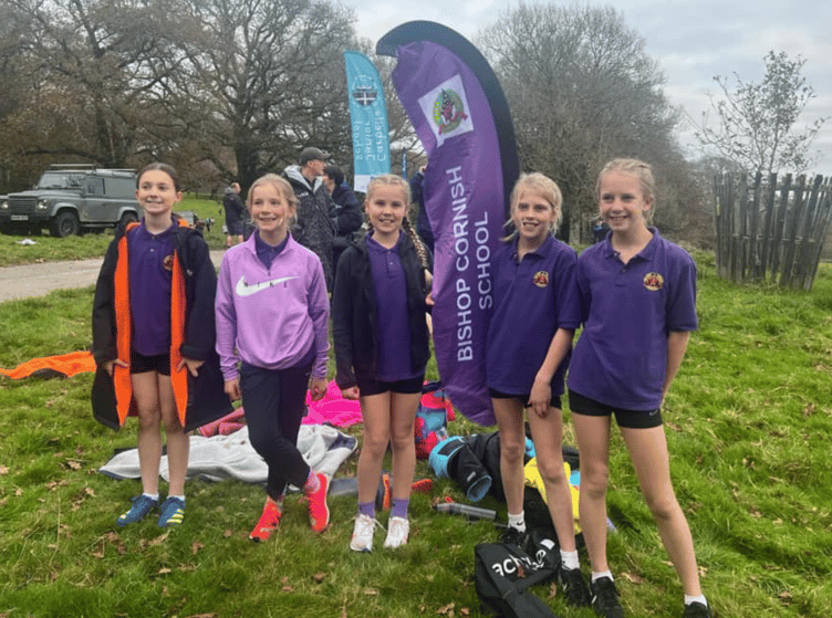 Year 5/6 girls from Bishop Cornish Primary School are all smiles ahead of competing in the Primary Schools Cross Country event at Lanhydrock