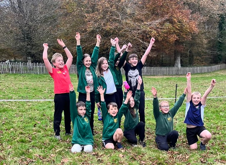 Youngsters from Trewidland Primary School show their excitement ahead of the latest Primary Schools Cross Country event at Lanhydrock
