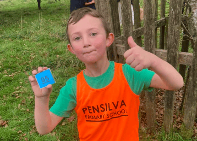 A big thumbs up from Joshua Firth of Pensilva Primary School after he finished the Cross Country event at Lanhydrock