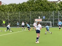 Petersfield women win and boys lose on a windy day for hockey