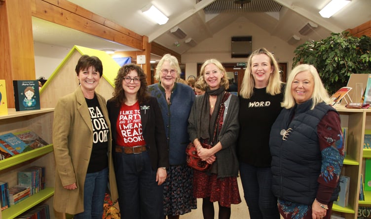Attending the opening of a new library for Dulverton schoolchildren were (left to right) literary festival director Ali Pegrum with authors Claire Barker, Victoria Eveleigh, Sarah Easter Collins, and Kate Lord Brown, and town council chairman Cllr Christine Dubery. PHOTO: George Ody.