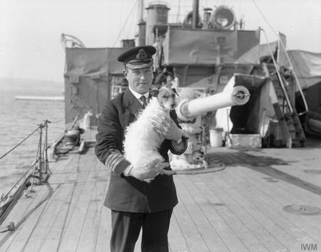 <p>Captain Gordon Campbell, VC and bar, DSO (two bars) with his pet dog.</p>