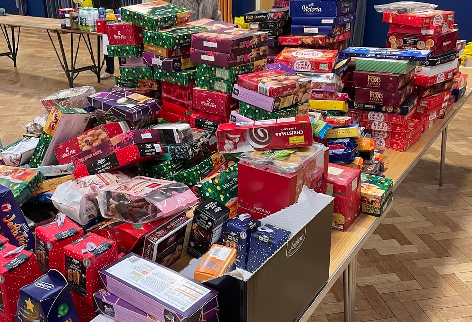 <p>Festive goodies are sorted by the Farnham Lions</p>
