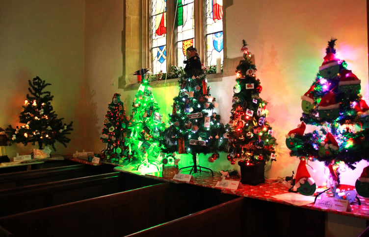 Entries adorn St Decuman’s Church, Watchet, for its Christmas tree festival. PHOTO: George Ody.
