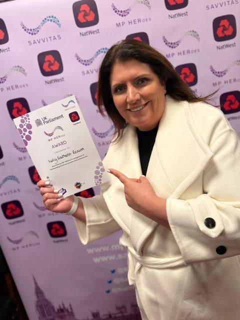 <p>Kerry Southern-Reason of Care Home Interiors Group with her MP HERoes Businesswoman Award.</p>