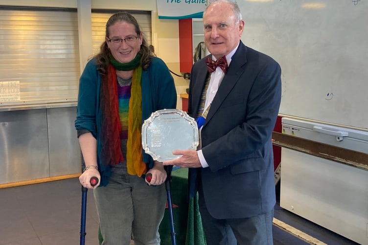 Simon Moran-Smith presents Judith Riggs with the Lions Endeavour Trophy, Frensham Pond Sailability, December 4th 2024.