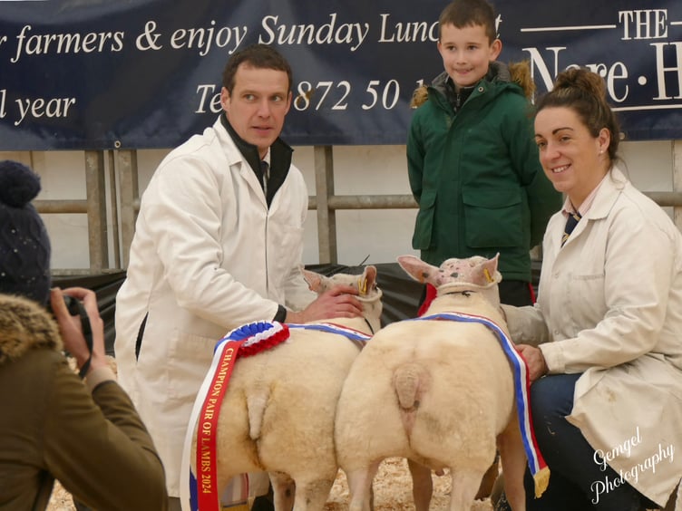 Paul and Lin Calcraft with their champion pair of lambs